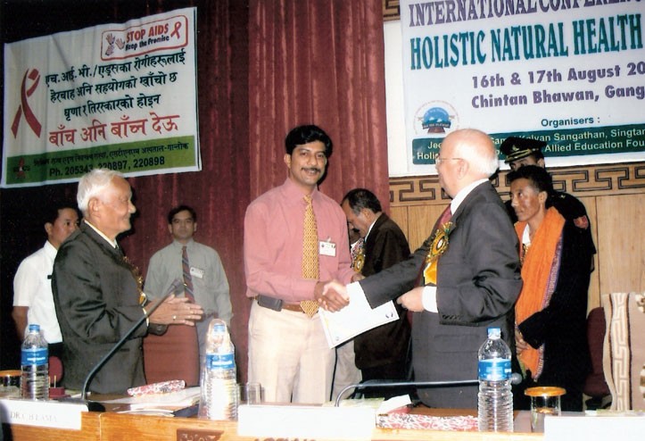 Mr. and Mrs. Hemant Girme with Swami Ramdev